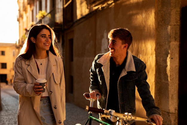 Free photo medium shot couple walking together