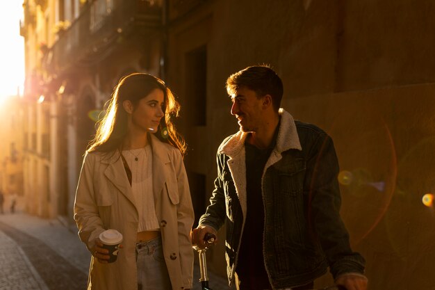 medium shot couple walking together