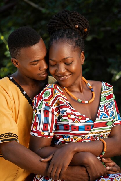 Medium shot couple wearing native attire