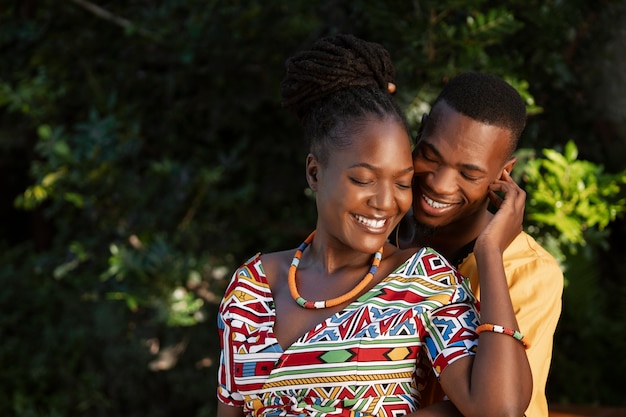 Free photo medium shot couple wearing native attire