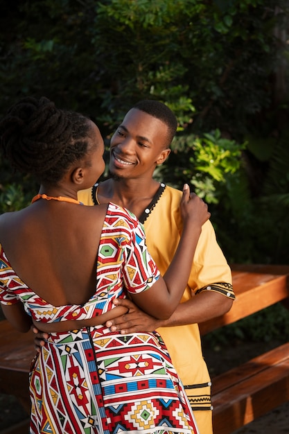 Free photo medium shot couple wearing native attire