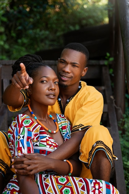 Medium shot couple wearing native attire