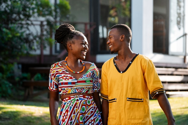 Medium shot couple wearing native attire