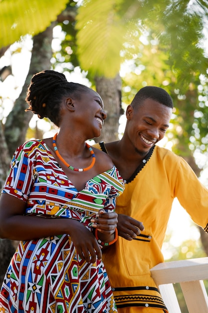 Free photo medium shot couple wearing native attire