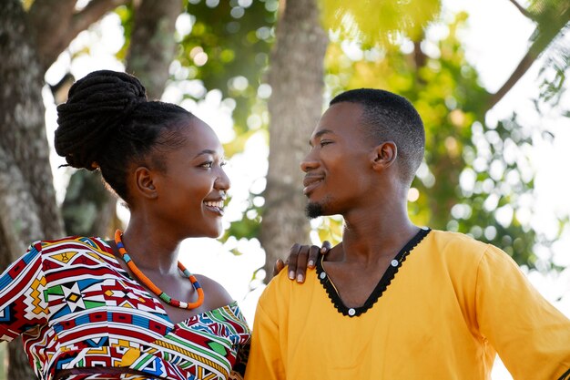 Medium shot couple wearing native attire