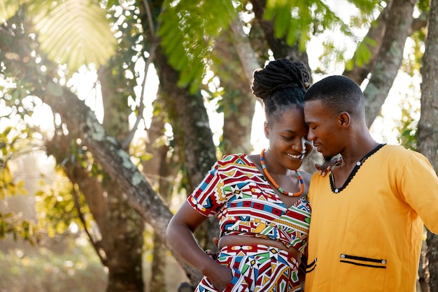 Medium shot couple wearing native attire