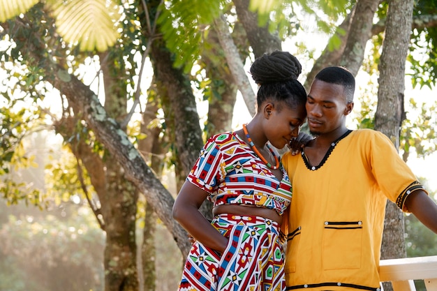 Free photo medium shot couple wearing native attire