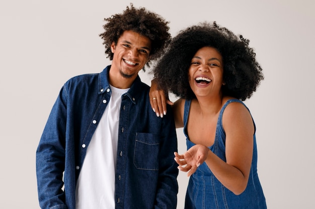 Medium shot couple with afro hairstyles