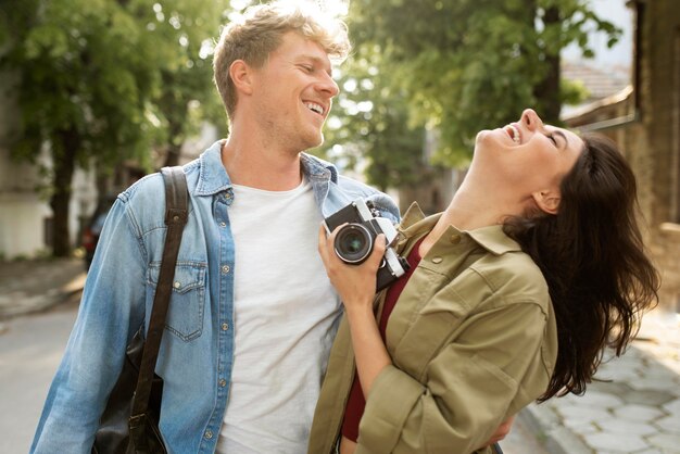 Medium shot couple with camera