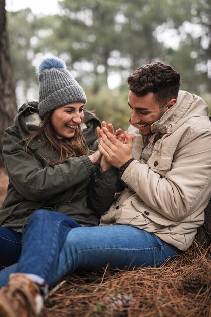 Medium shot cute couple in nature