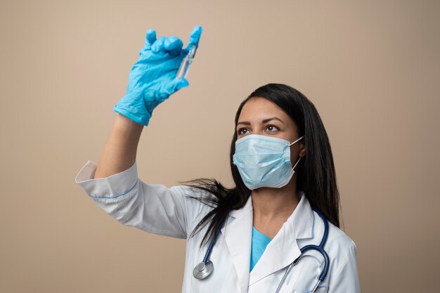 Medium shot doctor holding glove