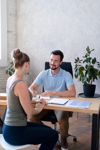 Medium shot doctor talking to woman