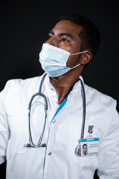 Medium shot doctor wearing mask