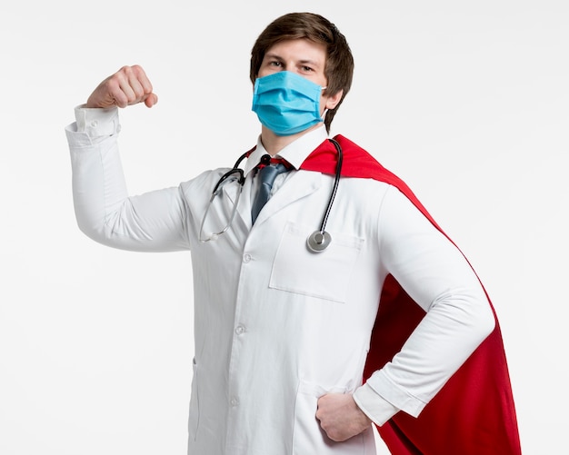 Medium shot doctor wearing surgical mask