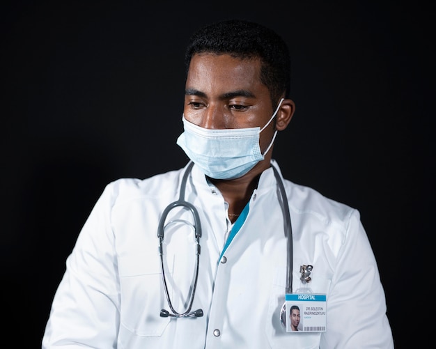 Medium shot doctor with stethoscope