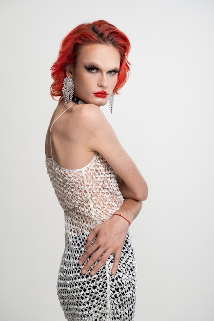 Free photo medium shot drag queen wearing shiny dress