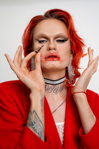 Medium shot drag queen with fake lashes