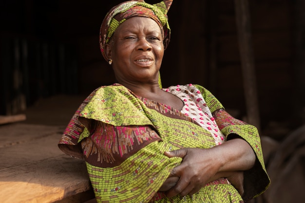 Medium shot elderly woman outdoors