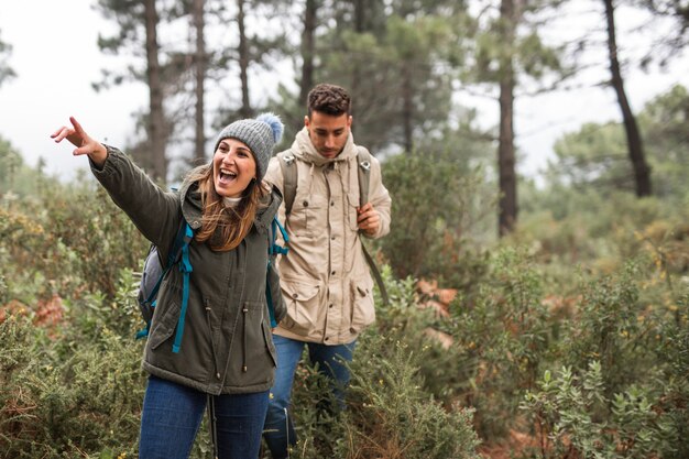 Medium shot excited people outdoors