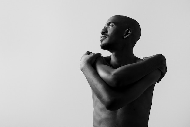 Medium shot expressive man posing at studio