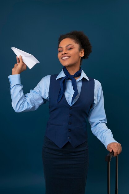 Medium shot female flight attendant in studio