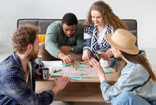 Medium shot friends planning trip