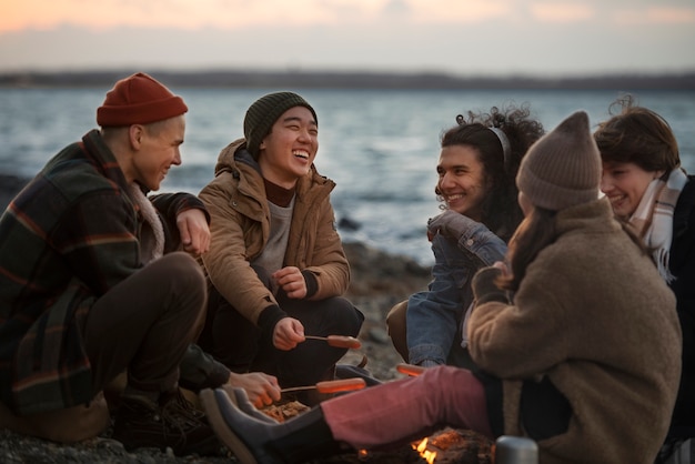 Free photo medium shot friends sitting together