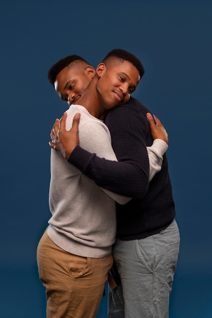 Free photo medium shot gay black men posing