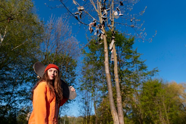 Medium shot girl carrying board