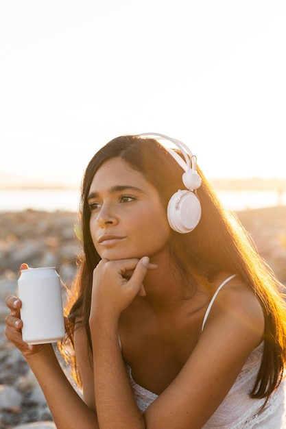 medium shot girl listening to music
