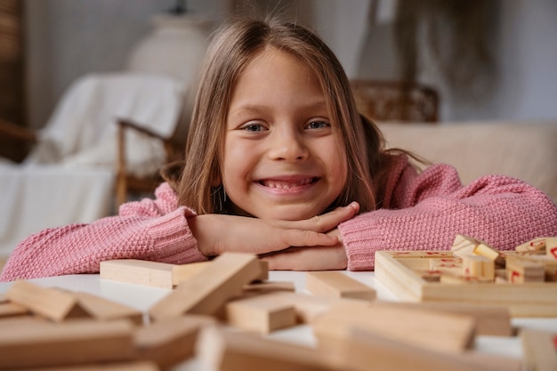 Medium shot girl playing memory game