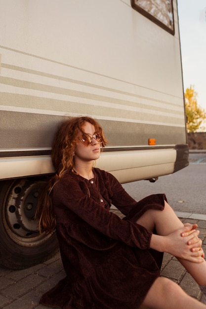 Free photo medium shot girl posing outdoors