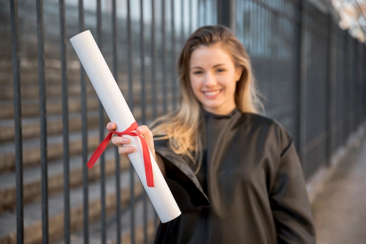 Free Photo medium shot girl smiling holding her certificate 