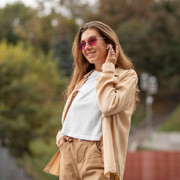 Medium shot girl wearing earphones