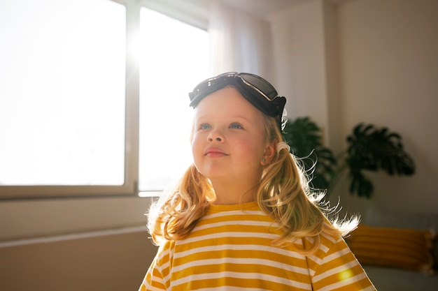 Medium shot  girl wearing flying goggles