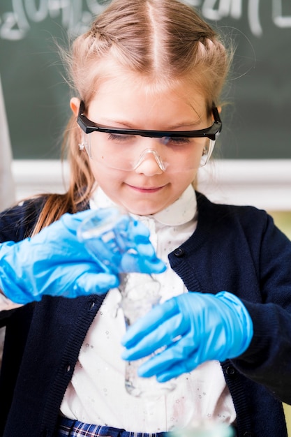 Free photo medium shot girl wearing protection gloves