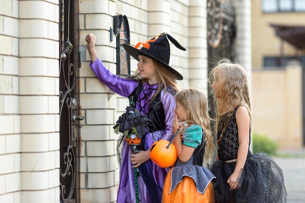 Medium shot of girl with trick or treat