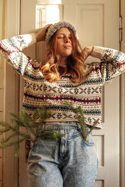 Free photo medium shot girl with twigs in her pockets