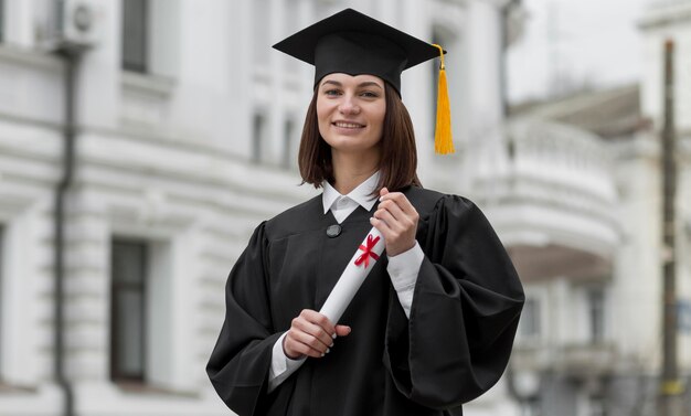 Medium shot graduate student with diploma