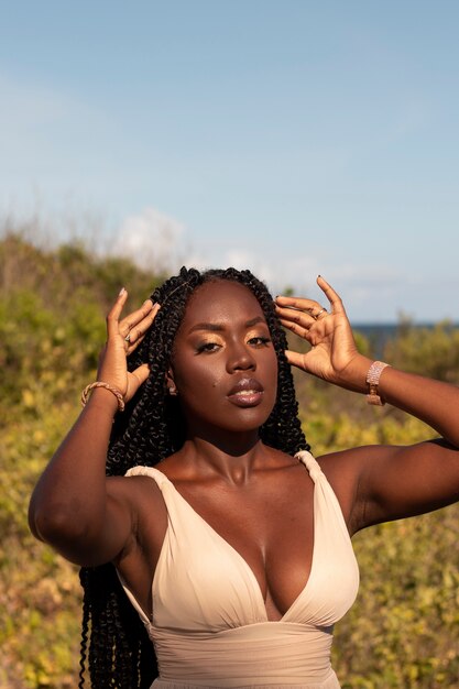 Medium shot greek goddess posing in nature