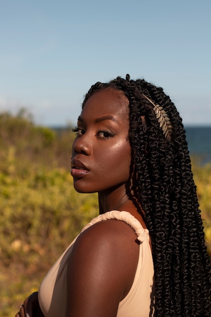 Medium shot greek goddess posing in nature