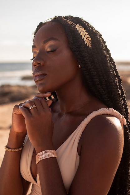 Free photo medium shot greek goddess posing in nature