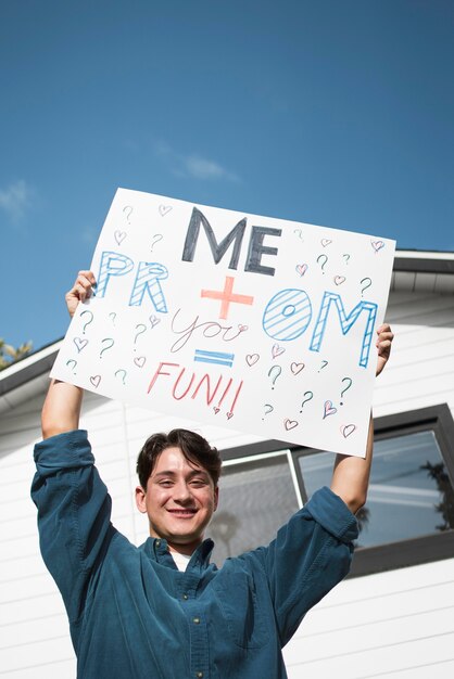 Medium shot guy holding banner