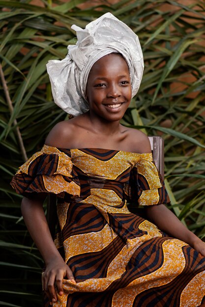 Medium shot happy african girl portrait