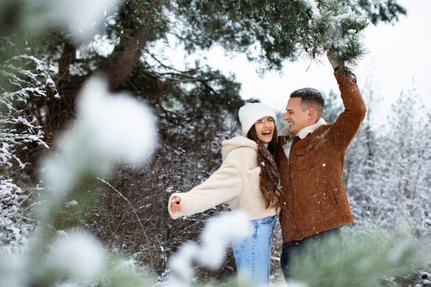 Medium shot happy couple outdoors