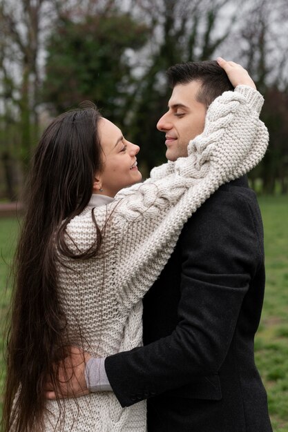 Medium shot happy couple outdoors