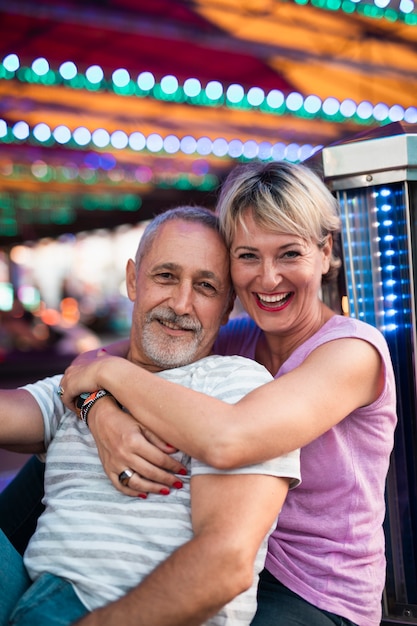 Free photo medium shot happy couple posing together