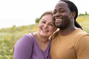 Free photo medium shot happy couple posing