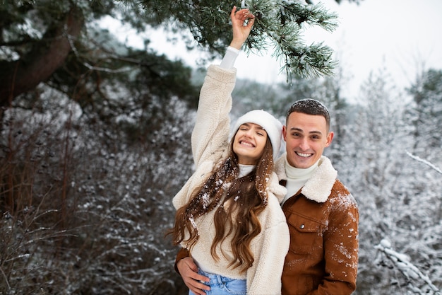 Free photo medium shot happy couple posing