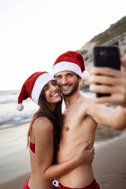 Medium shot happy couple taking selfie